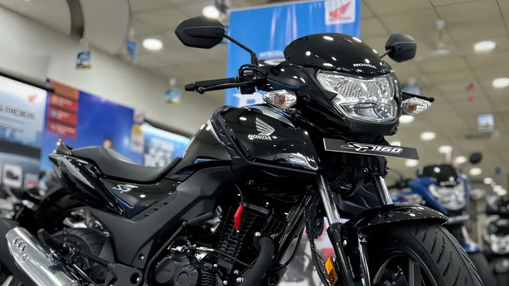 When it comes to choosing a reliable daily commuter, many people look for a motorcycle that offers good mileage, comfortable handling, and stylish looks. The Honda SP 160 fits that description perfectly. It is designed for city riding, office commutes, and even occasional long rides, all while offering a sporty appeal. Honda has made sure that the SP 160 stands out in the 150-160cc commuter bike segment by combining performance and style at an affordable price. Let’s take a closer look at what makes this bike a solid choice for everyday riders. Attention Please: Sporty Yet Practical Design The Honda SP 160 is not just another regular commuter bike. It looks more premium and stylish compared to many other bikes in its segment. It borrows design inspiration from Honda's sportier models but still keeps the overall styling subtle enough for daily use. The sharp headlamp, aggressive tank shrouds, and sleek tail section give it a modern and youthful appearance. The digital instrument cluster adds to its appeal, offering all necessary information in a clean format. Even though it has a sporty look, the overall design is still practical. The seating posture is upright, the seat is wide and comfortable, and the handlebars are positioned in a way that doesn’t cause strain, even during longer rides. Attention Please: Reliable Engine and Smooth Performance At the heart of the Honda SP 160 is a 162.71cc air-cooled, single-cylinder engine, which is tuned for city performance and fuel efficiency. It produces a decent 13.27 bhp and 14.6 Nm of torque, which is more than enough for daily commuting and occasional highway rides. The engine is paired with a 5-speed gearbox, and gear shifts feel smooth and responsive. The throttle response is clean, and the power delivery is linear, making it easy to ride in traffic without needing to constantly shift gears. The SP 160 also gets Honda’s PGM-FI (Programmed Fuel Injection) system, which helps improve fuel efficiency and ensures smoother throttle performance. Overview Table: Honda SP 160 – Key Details Feature Specification Engine 162.71cc, Air-Cooled, Single-Cylinder Max Power 13.27 bhp @ 7,500 rpm Max Torque 14.6 Nm @ 5,500 rpm Transmission 5-Speed Manual Mileage (Real-World) 45–55 km/l (approx.) Brakes Disc (Front & Rear) Suspension Telescopic Front, Monoshock Rear Tyres Tubeless – 17-inch Instrument Console Full Digital Kerb Weight Around 141 kg Fuel Tank Capacity 12 litres Price Range (Ex-showroom) ₹1.18 lakh – ₹1.22 lakh Attention Please: Comfortable Ride and Handling One of the strong points of the SP 160 is its ride comfort and handling. The bike uses a telescopic front fork and a monoshock rear suspension, which together provide a balanced and stable ride. Even on bumpy city roads, the SP 160 manages to absorb shocks well. The ground clearance is good enough for speed breakers and rough patches, and the low seat height makes it easy to handle, especially for shorter riders. At 141 kg, the bike feels light and nimble. It easily moves through traffic and corners well for a commuter. The brakes, especially the disc setup on both wheels (depending on variant), offer strong stopping power, adding to the overall confidence while riding. Attention Please: Fuel Efficiency That Matters In today’s times, fuel efficiency plays a huge role in choosing a bike, especially for people who ride daily. The Honda SP 160 delivers an impressive real-world mileage of 45–55 km/l, depending on riding style and traffic conditions. This makes it one of the more fuel-efficient bikes in its category. With a 12-litre fuel tank, the SP 160 can go more than 500 km on a single full tank, which is great for both city and semi-long rides. Attention Please: Digital Features and Practical Touches The SP 160 comes equipped with a fully digital instrument cluster, which shows: Speedometer Tachometer Trip meter Fuel gauge Gear position indicator Clock It may not be the most advanced display in the market, but it gives all the information clearly and is easy to read even under sunlight. Other practical features include engine kill switch, hazard light function, and tubeless tyres, which are essential for city riders. The overall fit and finish of the bike reflect Honda’s quality standards. FAQs – Honda SP 160 1. Is the Honda SP 160 good for beginners? Yes, the SP 160 is ideal for beginners. It has smooth power delivery, is easy to handle, and offers good comfort for daily rides. 2. What is the real mileage of the SP 160? In real-world conditions, you can expect around 45 to 55 km/l, depending on how and where you ride. 3. Does the SP 160 come with ABS? Yes, the SP 160 comes in two variants – single-channel ABS and dual-disc with single-channel ABS, offering decent safety under braking. 4. Is it suitable for long rides? While the SP 160 is mainly made for daily commuting, it can handle occasional short highway rides comfortably thanks to its smooth engine and stable ride. 5. How does it compare to other 160cc bikes? The SP 160 offers better comfort and mileage, and Honda's brand value gives it an edge in terms of long-term reliability and resale value. Conclusion The Honda SP 160 is a perfect daily commuter that ticks all the right boxes – sporty design, strong mileage, smooth handling, and Honda's trusted reliability. It's not trying to be a race bike or an adventure machine. Instead, it focuses on what most riders actually need – a practical, stylish, and fuel-efficient motorcycle that’s fun to ride every day. If you’re looking for a bike in the 150-160cc category that balances performance with comfort, the SP 160 is definitely worth considering.